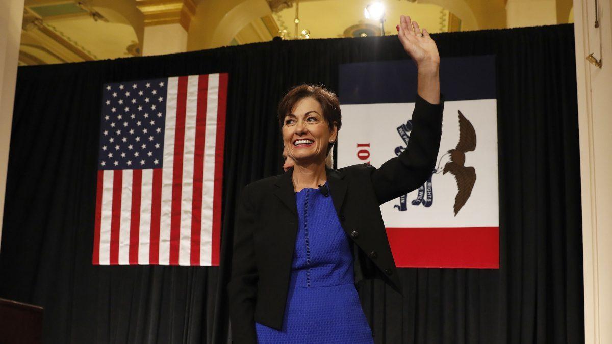 Iowa Gov. Kim Reynolds waves after speaking during a ceremonial swearing-in at the Statehouse in Des Moines, Iowa on May 24, 2017. (AP Photo/Charlie Neibergall)