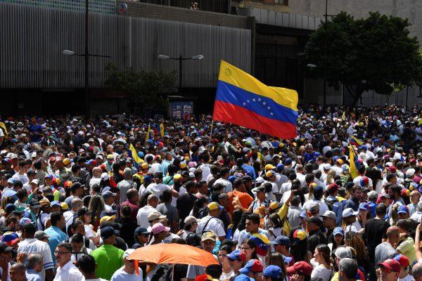 Venezuelan opposition supporters take to the streets to protest against the government of President Nicolas Maduro on Jan. 23, 2019. (Yuri Cortez/AFP/Getty Images)