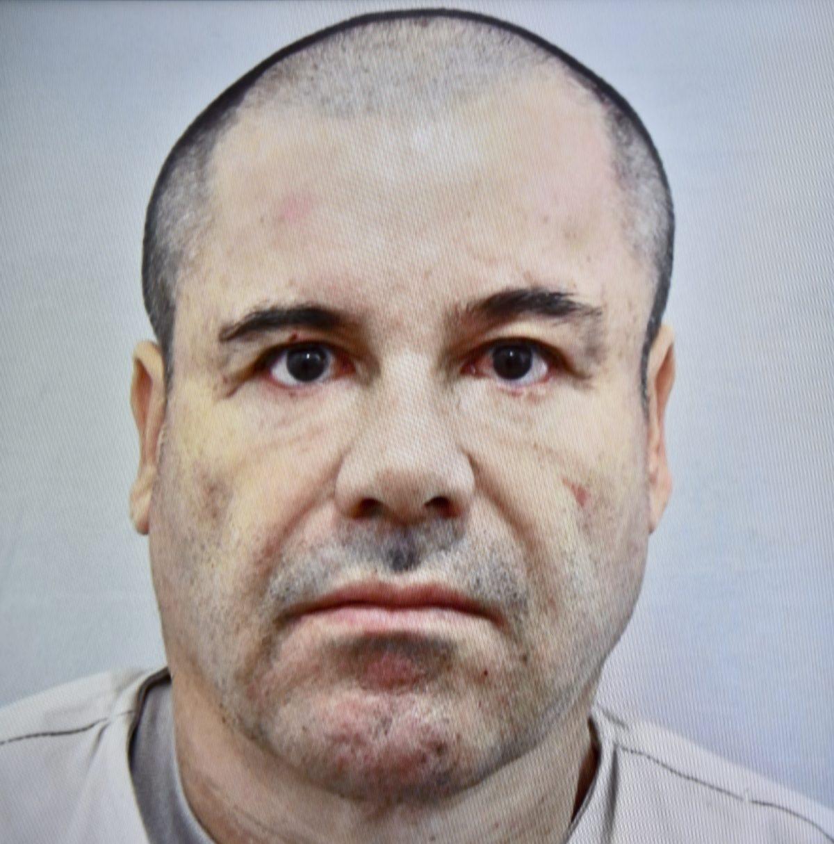 Picture taken from a TV screen of Mexican drug kingpin Joaquin “El Chapo” Guzman displayed during a press conference held at the Secretaria de Gobernacion in Mexico City, on July 13, 2015. (YURI CORTEZ/AFP/Getty Images)