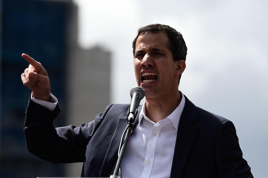 Venezuela's National Assembly head Juan Guaido speaks to the crowd during a mass opposition rally against leader Nicolas Maduro in which he declared himself the country's "acting president" in Caracas on Jan. 23, 2019. (Federico Parra/AFP/Getty Images)