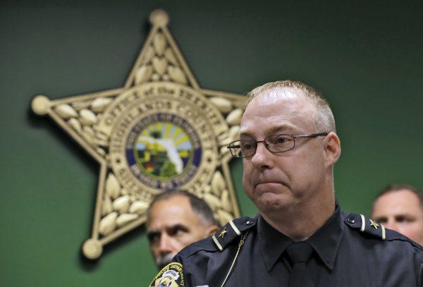 Sebring Police Chief Karl Hoglund reacts as he listens to a question during a news conference in Sebring, Fla., on Jan. 24, 2019. (AP Photo/Chris O'Meara)
