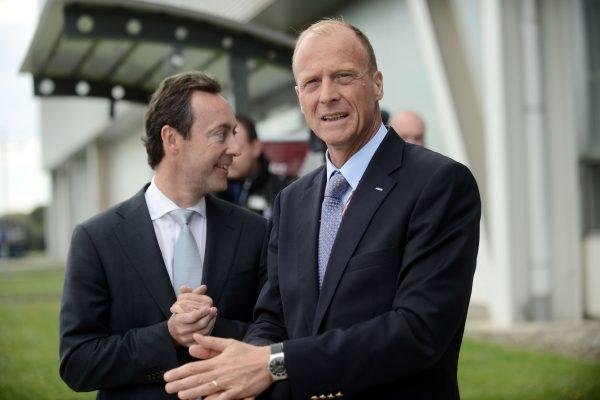 Thomas Enders, CEO of European aerospace giant Airbus Group (R) and Airbus CEO Fabrice Bregier pose upon arrival at the Jean-Luc Largardere factory, an Airbus assembly line in Toulouse, on April 11, 2015. (Remy Gabalda/AFP/Getty Images)