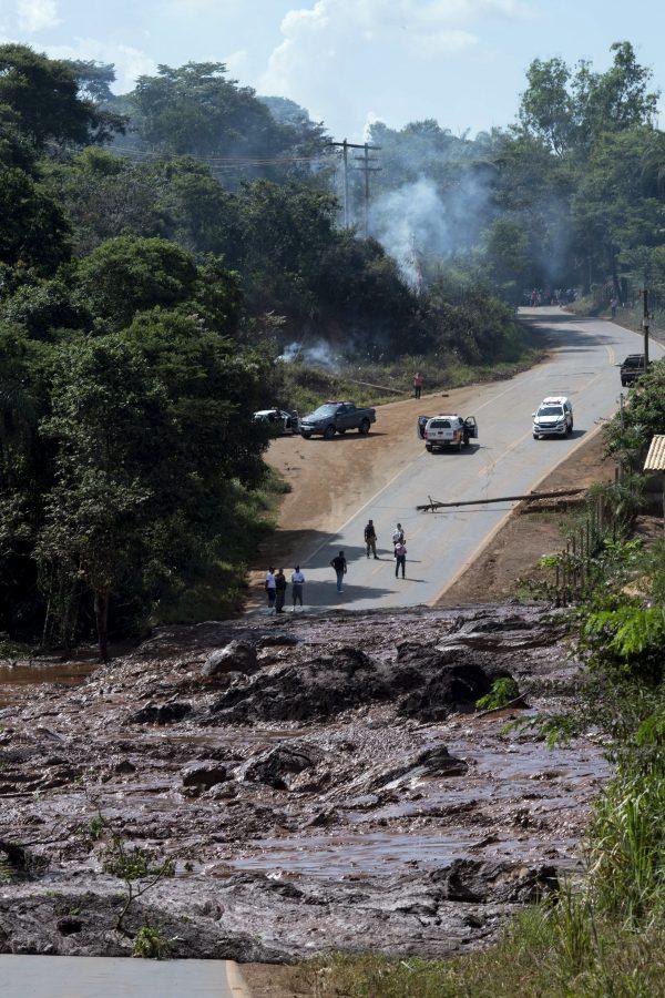 A road is blocked after a dam collapsed near Brumadinho, Brazil, on Jan. 25, 2019. (Leo Drumond/Nitro via AP)