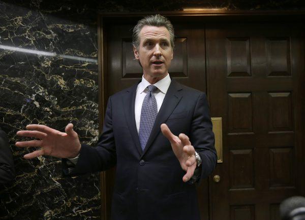 California Gov. Gavin Newsom discusses the results of an investigation that found Pacific Gas & Electric was not responsible for the Tubbs Fire in Sacramento, Calif., on Jan. 24, 2019. (Rich Pedroncelli/AP)