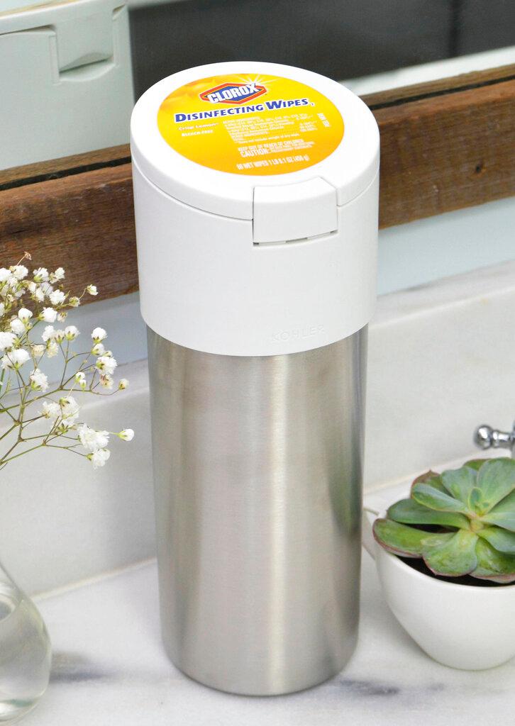 This photo shows Clorox's stainless steel wipe container designed for use with Loop. The new shopping platform announced at the World Economic Forum aims to change the way people buy many products, from food to personal-care and home products. Loop would do away with disposable containers for some name-brand products, including some shampoos and laundry detergents. Instead, those products would be delivered in sleek, reusable containers that will be picked up at your door, washed and refilled. (Dara Rackley/TerraCycle via AP)