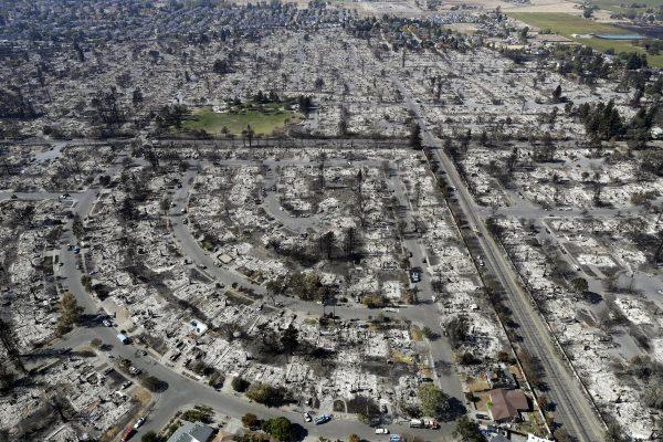 File photo shows an aerial view shows the devastation of the Coffey Park neighborhood after the Tubbs swept through in Santa Rosa, Calif., on Oct. 14, 2017. (Marcio Jose Sanchez/AP)
