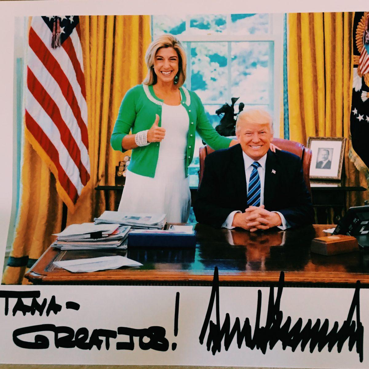 Tana Goertz with President Donald Trump in the Oval Office in the White House in Washington on May 4, 2017. The picture is autographed by President Trump. (Courtesy Tana Goertz)