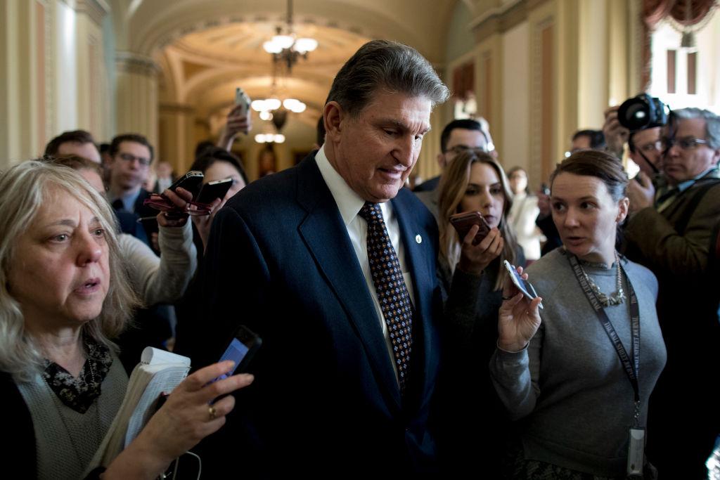 Sen. Joe Manchin (D-WV) speaks with reporters at the U.S. Capitol on Jan. 19, 2018. A continuing resolution to fund the government has passed the House of Representatives but faces a stiff challenge in the Senate. (Aaron P. Bernstein/Getty Images)