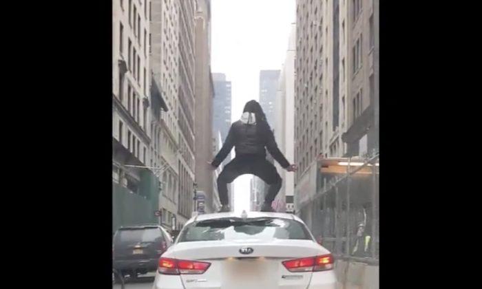 Crazed Cyclist Leaps on Uber Roof in Midtown Manhattan, Attacks Driver With Lock