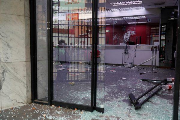 Damage is seen in a bank after it was looted in Caracas, Venezuela, on Jan. 24, 2019. (Carlos Garcia Rawlins/Reuters)