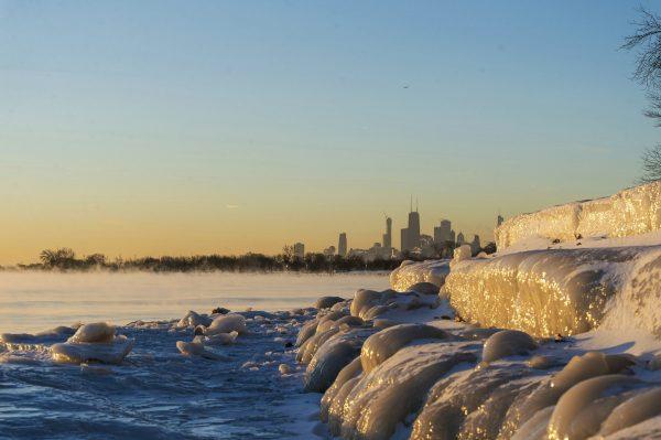 Chicago's lakefront is frozen over on Jan. 25, 2019. The National Weather Service had a wind chill warning in effect until 12 p.m. today for counties in northwestern and north-central Illinois. (Tyler LaRiviere/Chicago Sun-Times via AP)