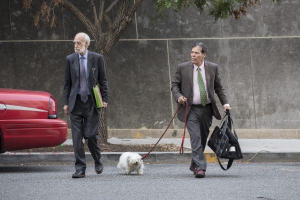 Randy Credico (R) and his dog Bianca arrive at U.S. District Court in Washington on Sept. 7, 2018. (Drew Angerer/Getty Images)