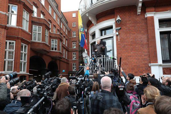 Julian Assange speaks to the media from the balcony of the Embassy Of Ecuador in London, England on May 19, 2017. (Jack Taylor/Getty Images)
