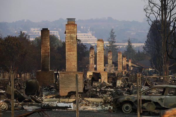 File photo shows a row of chimneys standing in a neighborhood devastated by the Tubbs fire near Santa Rosa, Calif., on Oct. 13, 2017. (Jae C. Hong/AP)