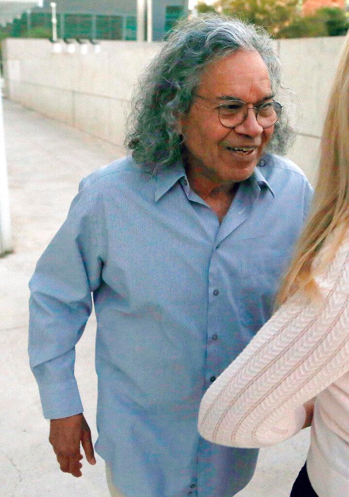In this Oct. 26, 2017 file photo, Insys Therapeutics founder John Kapoor leaves U.S. District Court in Phoenix. Kapoor goes on trial Monday, Jan 28, 2019, in U.S. District Court in Boston, accused of scheming to bribe doctors into writing a large number of prescriptions for the powerful fentanyl-based pain painkiller Subsys. (AP Photo/Ross D. Franklin, File)