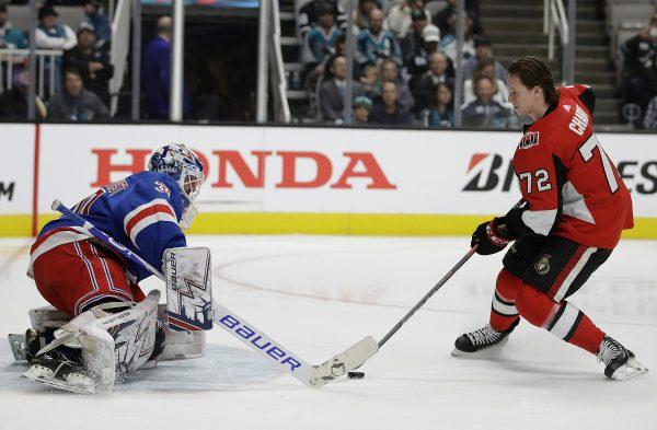 New York Rangers' Henrik Lundqvist, left, defends a shot attempt by Ottawa Senators' Thomas Chabot during the Skills Competition, part of the NHL hockey All-Star weekend, in San Jose, Calif., on Jan. 25, 2019. (Ben Margot/AP)
