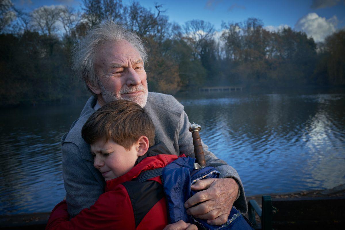 Patrick Stewart (L) and Louis Ashbourne Serkis in “The Kid Who Would Be King.” (Kerry Brown/Twentieth Century Fox)