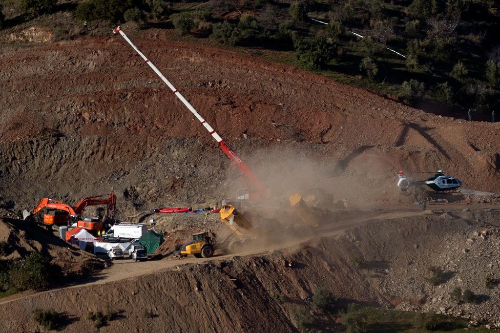 A helicopter of the Spanish Guardia Civil, transporting explosives, lands at the site where a child fell down a well in Totalan, southern Spain, on Jan. 24, 2019. (Jorge Guerrero/AFP/Getty Images)