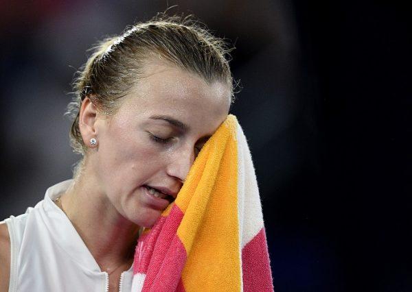 Petra Kvitova of the Czech Republic wipes sweat from her face during her women's singles final against Japan's Naomi Osaka at the Australian Open tennis championships in Melbourne, Australia, on Jan. 26, 2019. (Andy Brownbill/AP Photo)