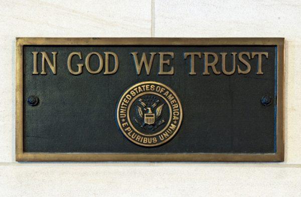 Two identical In God We Trust bronze plaques placed in 1961 at: (1) Longworth House Office Building, main lobby, east wall. (2) Dirksen Office Building, southwest entrance, west wall. (USCapitol/Wiki Commons)