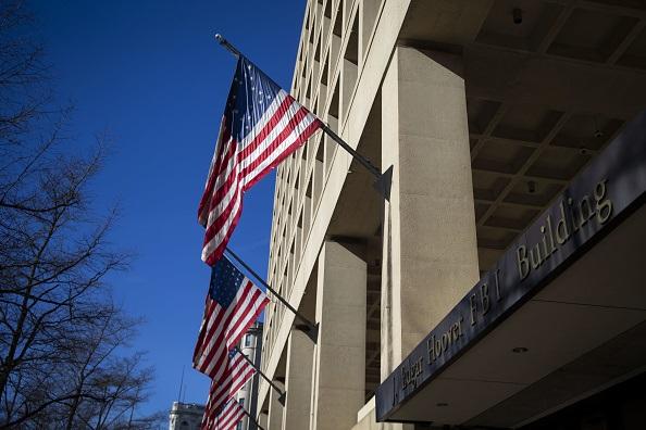 American flags fly outside the Federal Bureau of Investigation (FBI) headquarters in Washington, D.C., U.S., on Tuesday, Jan. 22, 2019. ( Al Drago/Bloomberg via Getty Images)