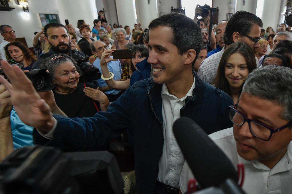 Venezuela's National Assembly head and self-proclaimed "acting president" Juan Guaido arrives for a mass in honor to the fallen in the fight for freedom, political prisoners and the exiled, at the San Jose church in Caracas on Jan. 27, 2019. (LUIS ROBAYO/AFP/Getty Images)