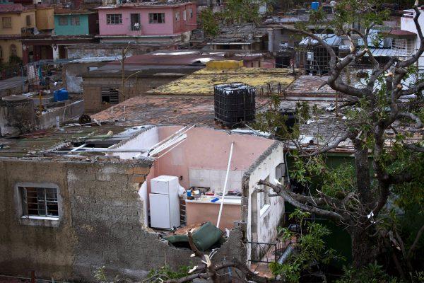 A home's kitchen is exposed after a tornado ripped the roof off in Havana, Cuba, on Jan. 28, 2019. (Ramon Espinosa/AP)