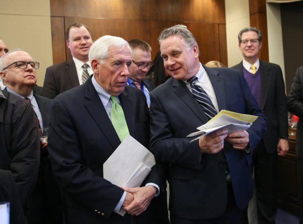 Rep. Chris Smith (R-N.J.) (R) speaks with former Rep. Frank Wolf (R-Va.) at the Victims of Communism Memorial Foundation's Truman-Reagan Medal of Freedom award ceremony honoring Cardinal Joseph Zen in Washington on Jan. 28, 2019. (Samira Bouaou/The Epoch Times)