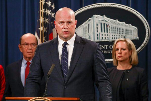 Acting Attorney General Matthew Whitaker announces indictments against Chinese telecommunications company Huawei, with Commerce Secretary Wilbur Ross (L), Homeland Security Secretary Kirstjen Nielsen (R), and other officials at the Department of Justice in Washington on Jan. 28, 2019. (Charlotte Cuthbertson/The Epoch Times)