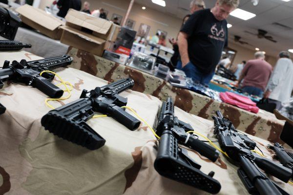 Guns stand for sale at a gun show on November 24, 2018 in Naples, Florida.(Photo by Spencer Platt/Getty Images)