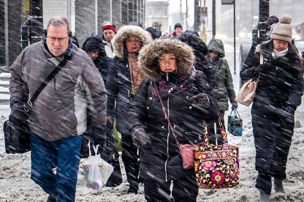 Morning commuters face a tough slog on Wacker Drive in Chicago, on Jan. 28, 2019. (Rich Hein/Chicago Sun-Times via AP)
