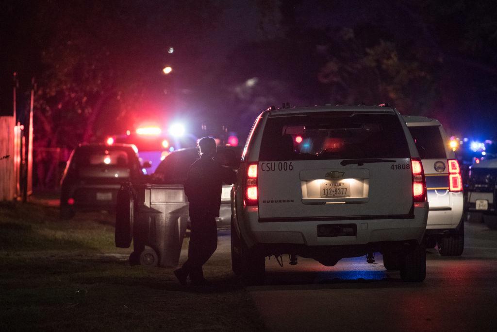 Law enforcement personnel work at the scene of a shooting where five Houston police officers were reported shot in Houston, Texas on Jan. 28, 2019. (Loren Elliott/Getty Images)
