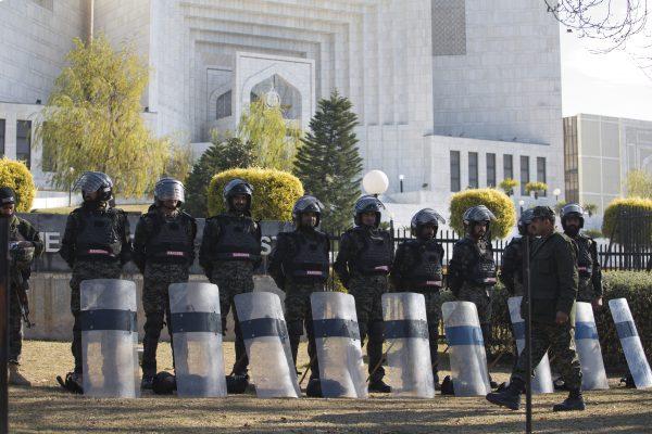 Pakistani troops surround the Supreme Court building as security is beefed up during the hearing of blasphemy case against Pakistani Christian woman Aasia Bibi, in Islamabad, Pakistan on Jan. 29, 2019. (B.K. Bangash/AP Photo)