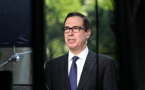 U.S. Treasury Secretary Steve Mnuchin speaks during a TV interview at the White House in Washington on May 21, 2018. (Kevin Lamarque/Reuters)