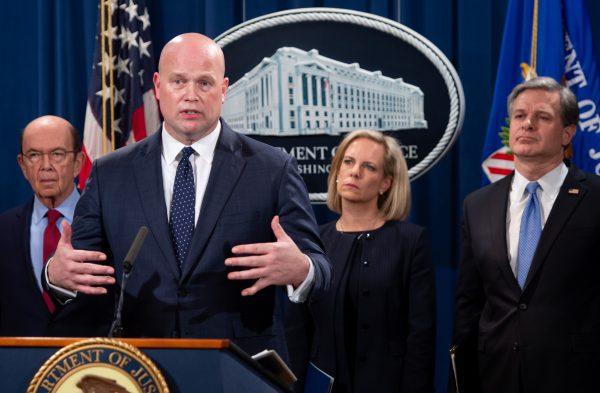 Acting US Attorney General Matthew Whitaker (2nd L), Secretary of Homeland Security Kirstjen Nielsen (2nd R), Commerce Secretary Wilbur Ross (L), and FBI Director Christopher Wray (R), announce charges against Chinese telecommunications manufacturer Huawei, as well as two affiliated companies and Huawei's CFO Meng Wanzhou, during a press conference at the Department of Justice in Washington, D.C., Jan. 28, 2019. (Saul Loeb/AFP/Getty Images)