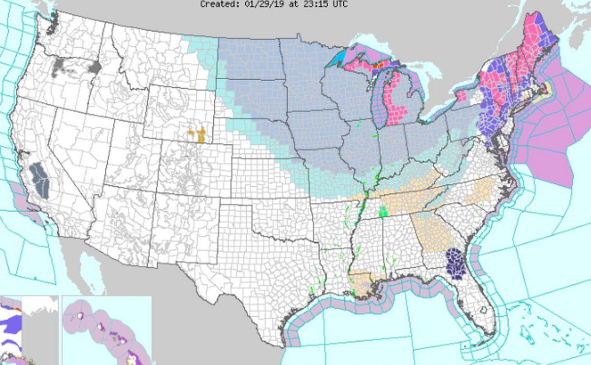 A winter storm is forecast to bring locally heavy snow to the Great Lakes region and Northeast United States through Tuesday. The pink and purple sections are winter storm watches and warnings (NWS)