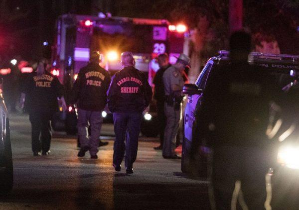 Police investigate the scene where several Houston Police officers were shot in Houston on Jan. 28, 2019. (Brett Coomer/Houston Chronicle via AP)