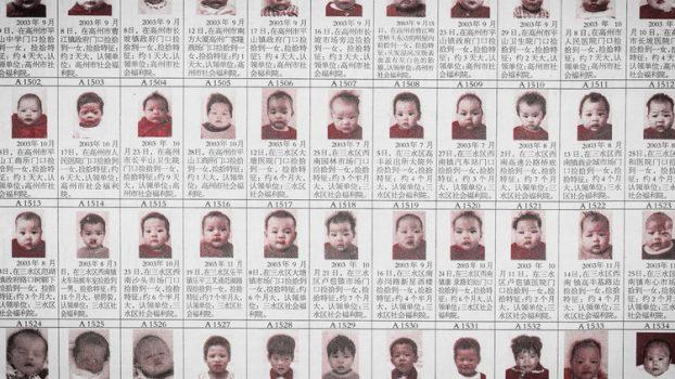 Photos of babies who were abandoned in communist China due to its one-child policy, as presented in the documentary “One Child Nation," winner of the Grand Jury Prize for US Documentary at the Sundance Film Festival Awards on Feb. 2, 2019. (Nanfu Wang/Courtesy of Sundance Institute)