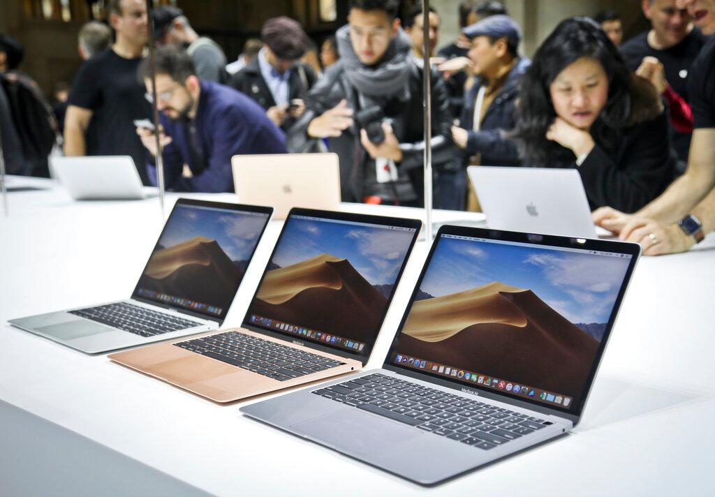 Apple's new MacBook Air computers are displayed during the company's showcase of new products in the Brooklyn borough of New York. Apple Inc. reports earnings Tuesday, Jan. 29, 2019. (Bebeto Matthews/AP Photo)