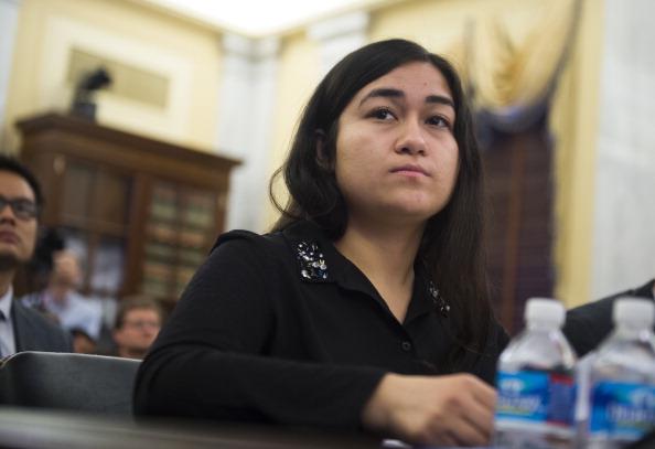 Jewher Ilham, daughter of Ilham Tohti, testifies at the Congressional-Executive Commission on China on Capitol Hill in Washington on April 8, 2014. (SAUL LOEB/AFP/Getty Images)