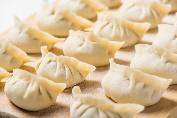  Lined up in rows, the dumplings are ready for cooking. (Shutterstock)
