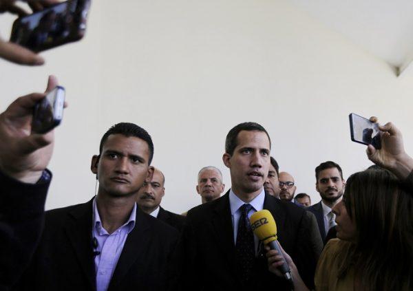 Opposition National Assembly President Juan Guaido, who declared himself interim president of Venezuela, speaks with the media upon his arrival to National Assembly in Caracas, Venezuela, on Jan. 29, 2019. (Fernando Llano/AP Photo)