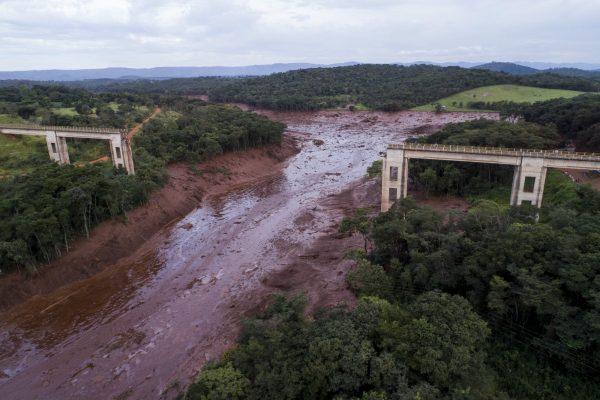 An aerial view shows a collapsed bridge caused by flooding triggered by a dam collapse near Brumadinho, Brazil, on Jan. 25, 2019. (Bruno Correia/Nitro via AP)
