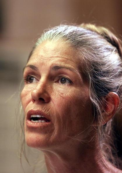 Leslie Van Houten, a former follower of Charles Manson, listens as former Deputy District Attorney Stephen Kay (not seen) describes the 1969 killing scene of the Smaldino couple during a parole hearing at the California Institution for Women in Corona, Califonia, on June 28, 2002. (Damian Dovarganes/AFP/Getty Images)