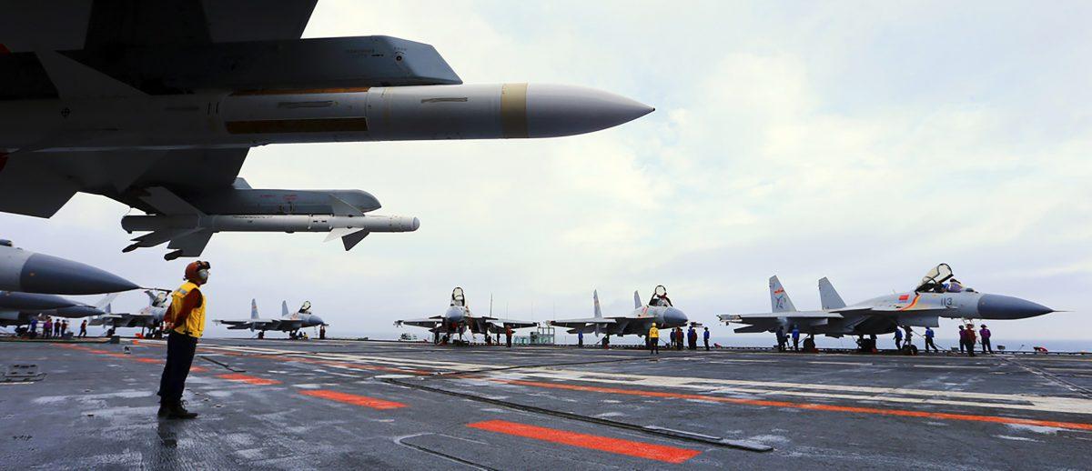 J15 fighter jets on China's sole operational aircraft carrier, the Liaoning, during a drill at sea in April 2018. (AFP/Getty Images)