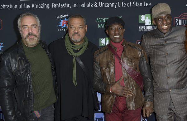 Titus Welliver, from left, Laurence Fishburne, Wesley Snipes, and Bill Duke arrive at Excelsior! A Celebration of the Amazing, Fantastic, Incredible & Uncanny Life of Stan Lee at the TCL Chinese Theatre in Los Angeles, on Jan. 30, 2019. (Richard Shotwell/Invision/AP)