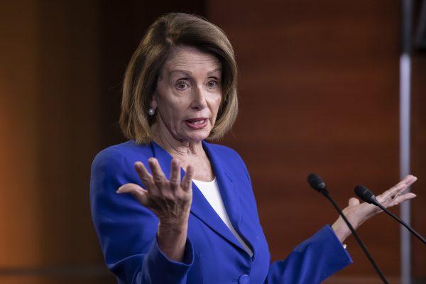 Speaker of the House Nancy Pelosi (D-Calif.) talks to reporters during a news conference a day after a bipartisan group of House and Senate bargainers met to craft a border security compromise aimed at avoiding another government shutdown, at the Capitol in Washington on Jan. 31, 2019. (J. Scott Applewhite/AP Photo)