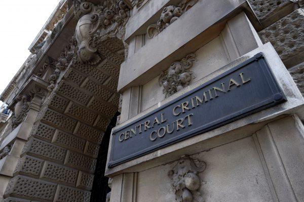 A sign is pictured at the main entrance of the Central Criminal Court, commonly referred to as The Old Bailey in central London on Ag.t 21, 2016. (Niklas Halle'n/AFP/Getty Images)