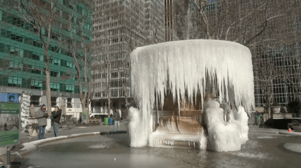 The iconic Bryant park fountain froze as temperatures in New York fell to 14 degrees Fahrenheit (minus 10 degrees Celsius), on Jan. 30. (Shelbi Malonson/The Epoch Times)