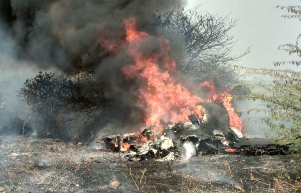 Smoke and fire billow after an Indian Air Force's Mirage 2000 trainer aircraft crashed in the southern city of Bengaluru, India, on Feb. 1, 2019. (Ismail Shakil/Reuters)